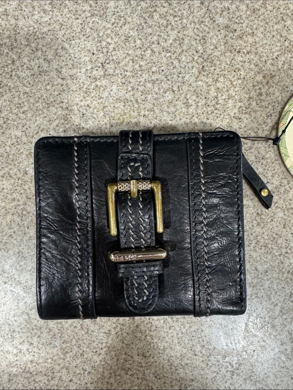 The Sak Black Leather Wristlet with Snap Accent